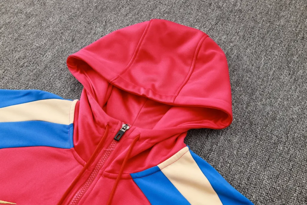 Red hoodie hood and zipper close-up