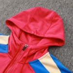 Red hoodie hood and zipper close-up
