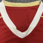 Red jersey white V-neck collar detail