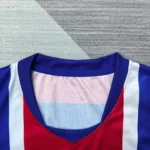 Blue red white football jersey V neck collar detail