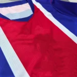 Blue red white football jersey fabric detail