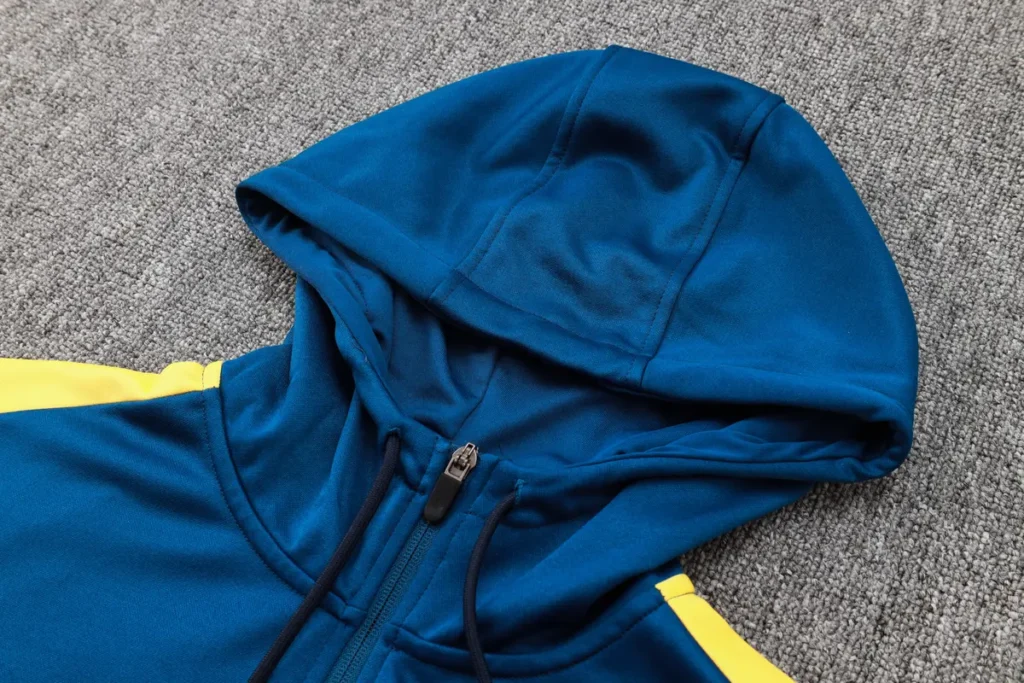 Teal hoodie hood and zipper close-up
