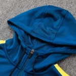 Teal hoodie hood and zipper close-up