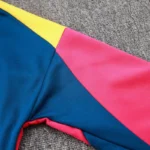 Yellow pink teal color block shoulder