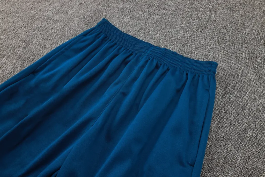 Teal pants side detail